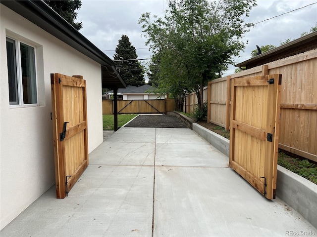 3210 Newport St, Denver, CO 80207 - fenced backyard featuring a patio area