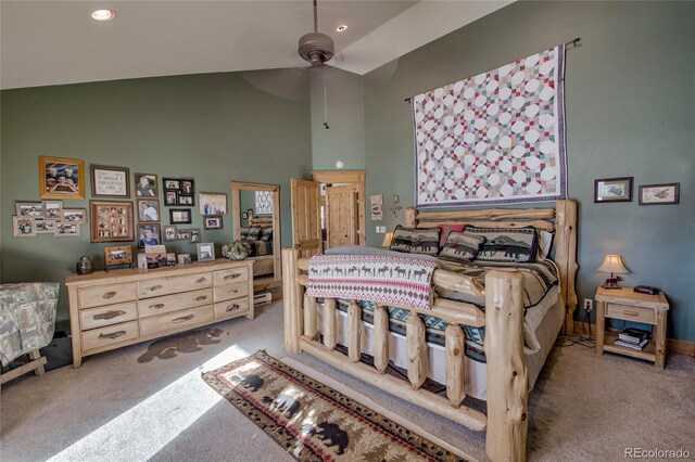 bedroom featuring carpet flooring, ceiling fan, and lofted ceiling