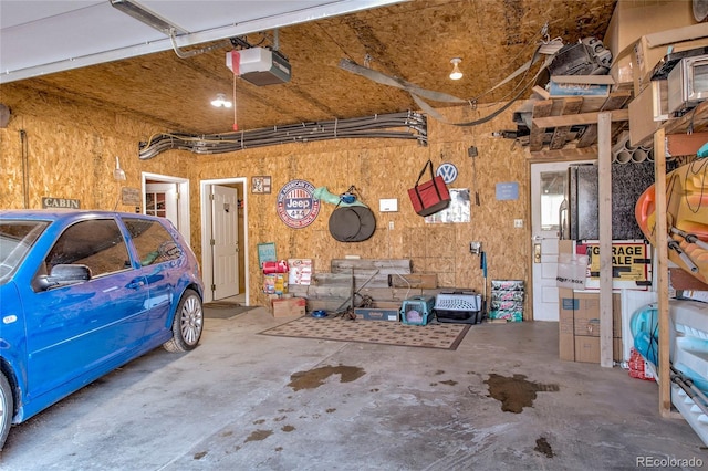 garage featuring a garage door opener