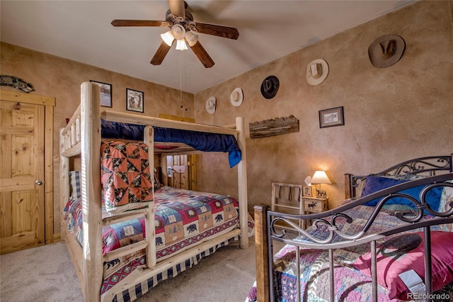 bedroom featuring carpet flooring and ceiling fan