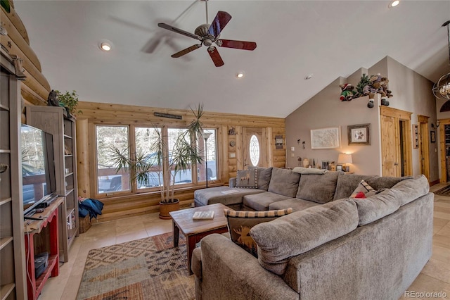 tiled living room with ceiling fan, high vaulted ceiling, and a healthy amount of sunlight