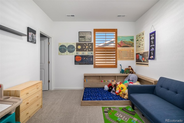 rec room with visible vents, baseboards, and carpet floors