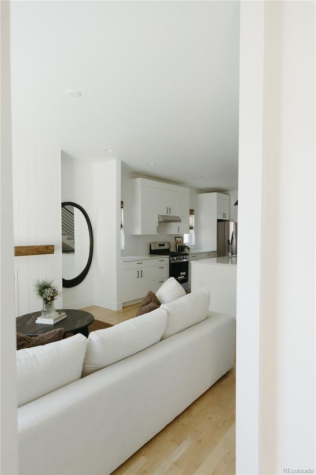 living area with light wood-style flooring