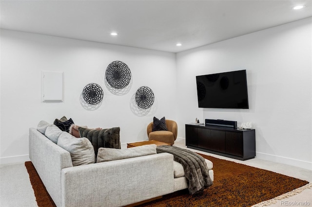 living area with carpet floors, recessed lighting, and baseboards