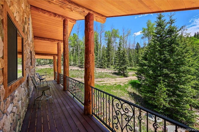 deck with a view of trees