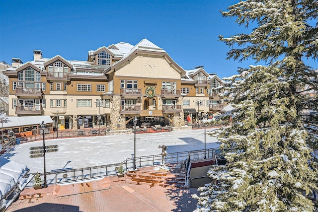 view of snow covered property