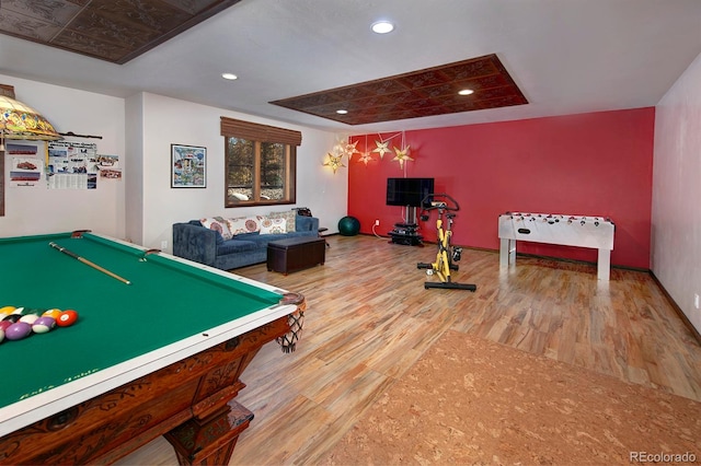 game room with hardwood / wood-style floors and billiards