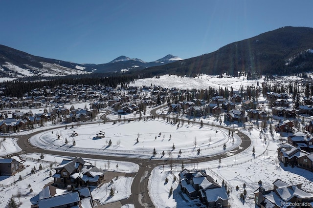 27 Habitat, Dillon, CO 80435 - snowy aerial view with a mountain view and a residential view