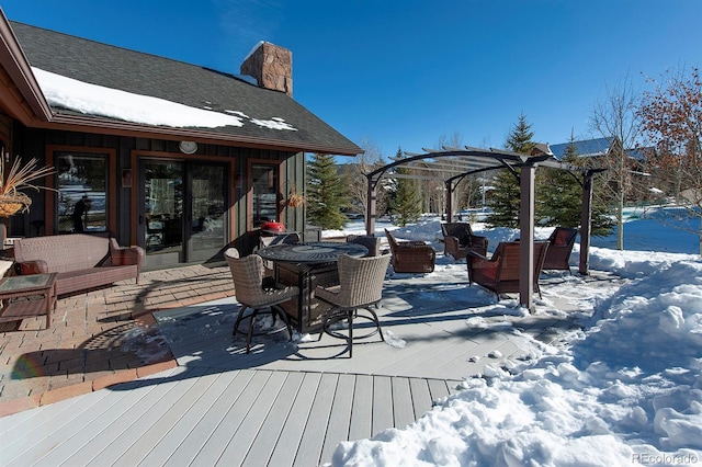 27 Habitat, Dillon, CO 80435 - snow covered deck featuring outdoor lounge area, outdoor dining area, and a pergola