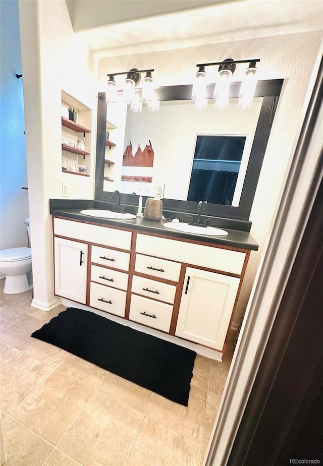 11975 Riverstone Cir Unit 9C, Commerce City, CO 80640 - full bath featuring double vanity and tile patterned floors