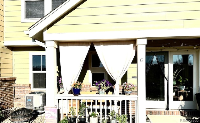 11975 Riverstone Cir Unit 9C, Commerce City, CO 80640 - view of property exterior featuring a porch