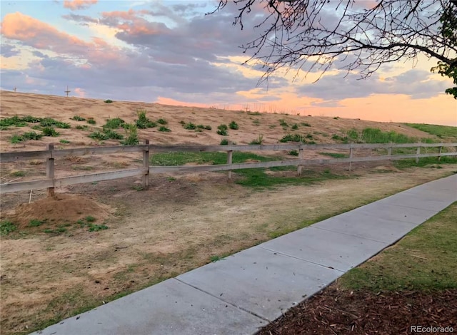 11975 Riverstone Cir Unit 9C, Commerce City, CO 80640 - yard at dusk featuring a view of rural / pastoral area