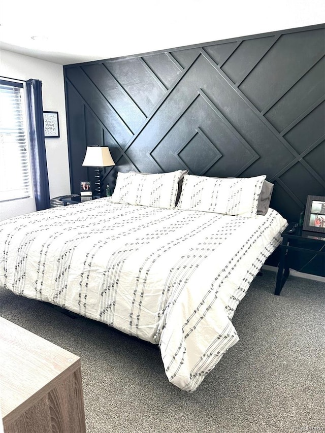 11975 Riverstone Cir Unit 9C, Commerce City, CO 80640 - bedroom with carpet and a decorative wall