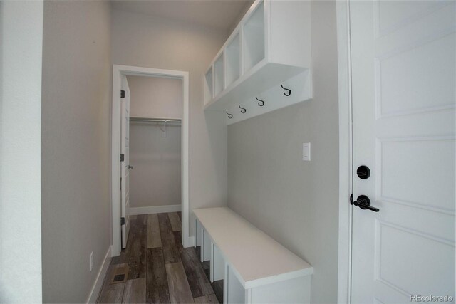 1732 Stable View Dr, Castle Pines, CO 80108 - mudroom with dark wood-style floors and baseboards