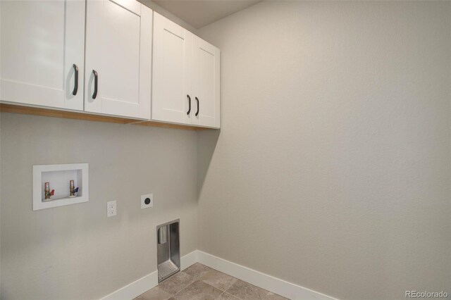 1732 Stable View Dr, Castle Pines, CO 80108 - washroom featuring cabinet space, baseboards, electric dryer hookup, and hookup for a washing machine