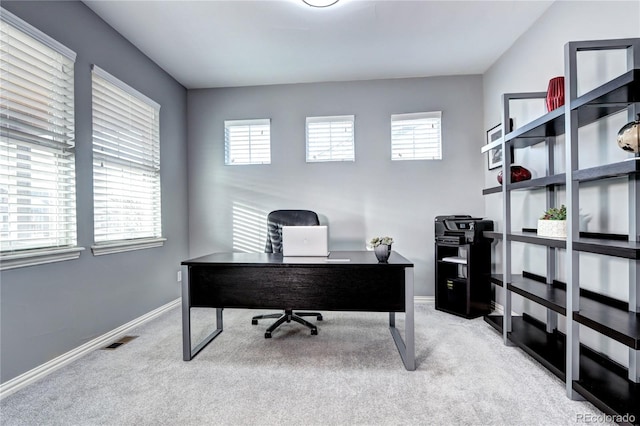 office area with light carpet