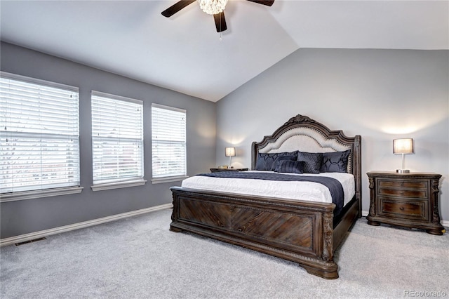 carpeted bedroom with lofted ceiling and ceiling fan