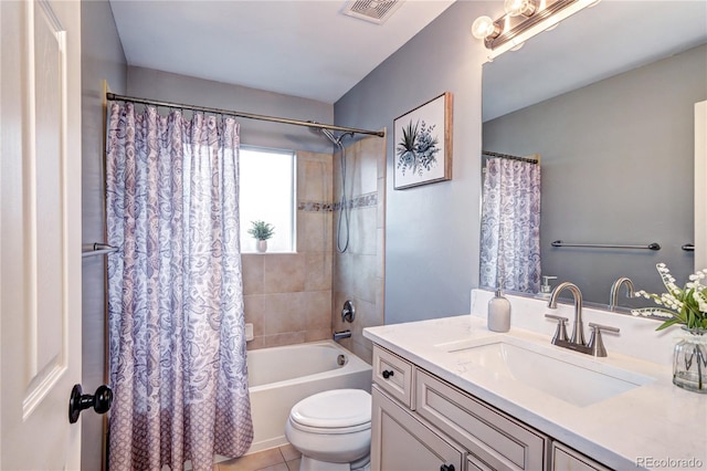 full bathroom with shower / bath combination with curtain, tile patterned floors, vanity, and toilet