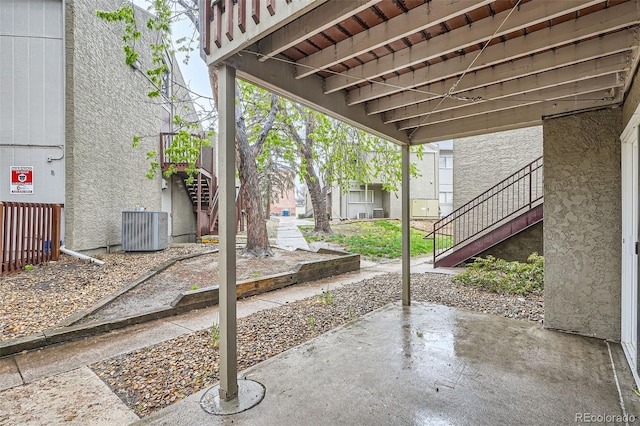 5300 E Cherry Creek S Drive 217, Denver, CO 80246 - view of patio featuring stairs and cooling unit