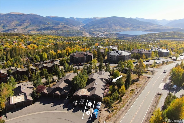 birds eye view of property featuring a mountain view