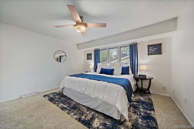 8364 Allison Ct, Arvada, CO 80005 - carpeted bedroom with a textured ceiling, a ceiling fan, and baseboards