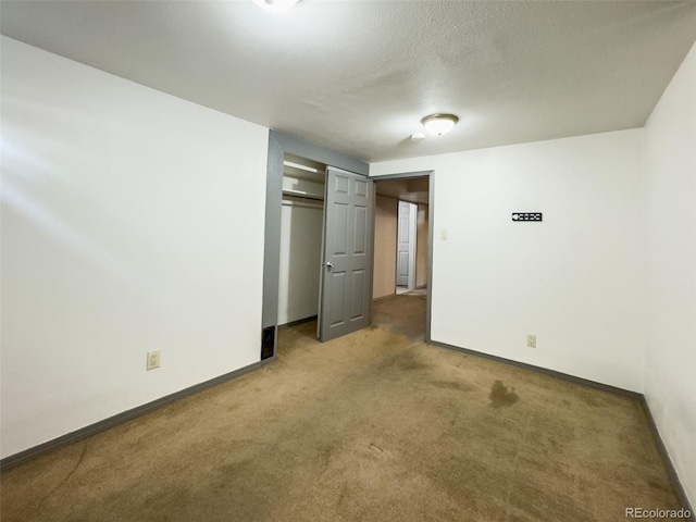 2114 N 21st St, Grand Junction, CO 81501 - unfurnished bedroom with carpet floors and a closet