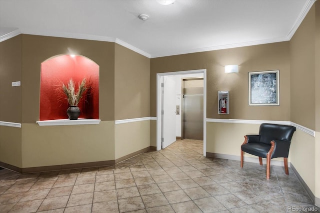 interior space with ornamental molding, elevator, and light tile patterned flooring