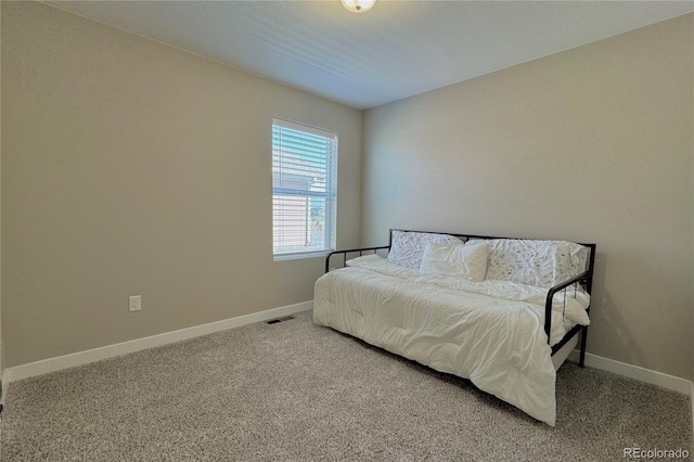 bedroom featuring carpet flooring