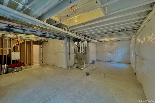 basement featuring heating unit