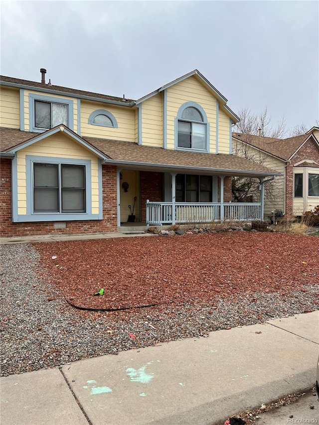 front of property featuring a porch