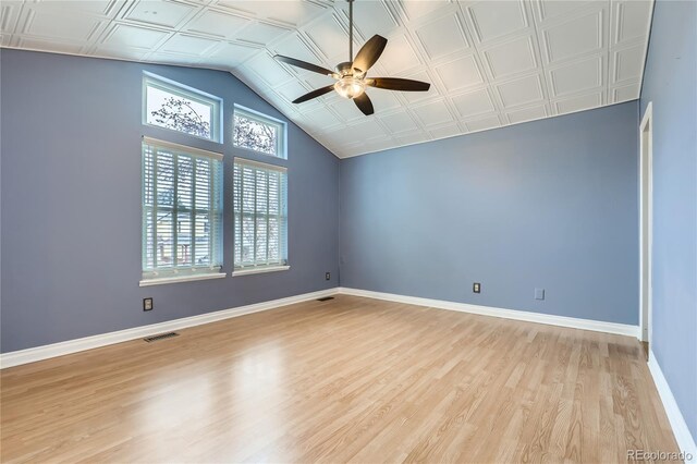 empty room featuring visible vents, baseboards, ceiling fan, light wood finished floors, and an ornate ceiling