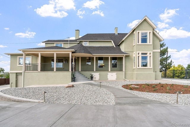 view of front of property featuring covered porch