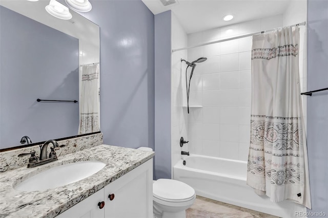 bathroom with shower / bath combo with shower curtain, visible vents, toilet, and vanity