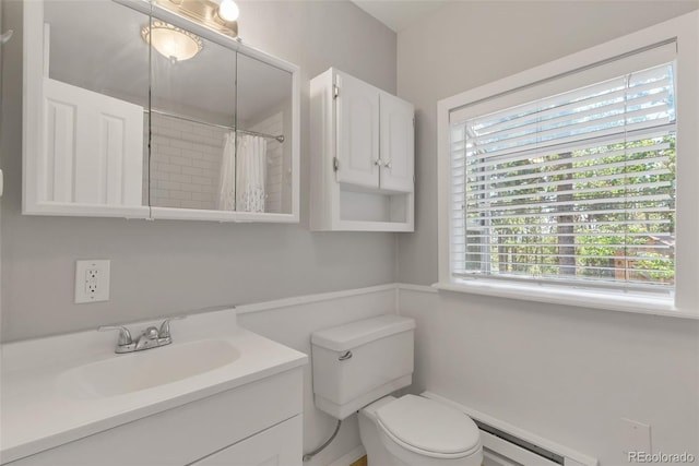 bathroom featuring vanity, a baseboard heating unit, curtained shower, and toilet