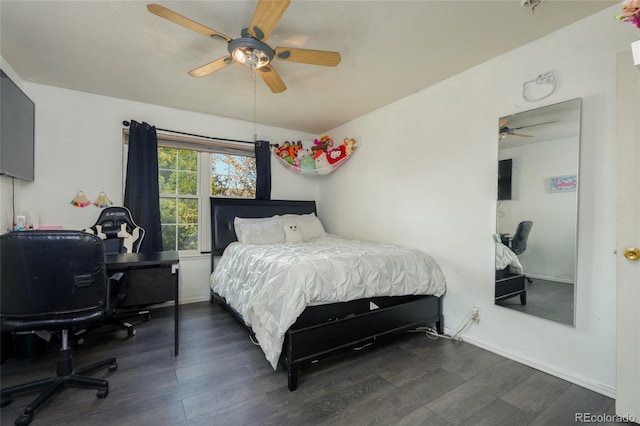 bedroom featuring dark wood-type flooring and ceiling fan