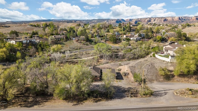 aerial view featuring a mountain view and a residential view