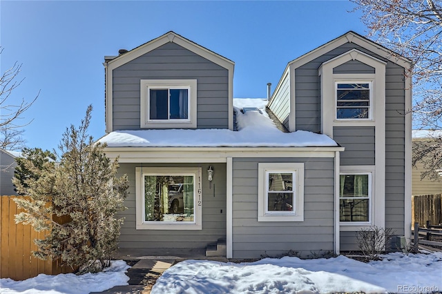 view of front of property with fence