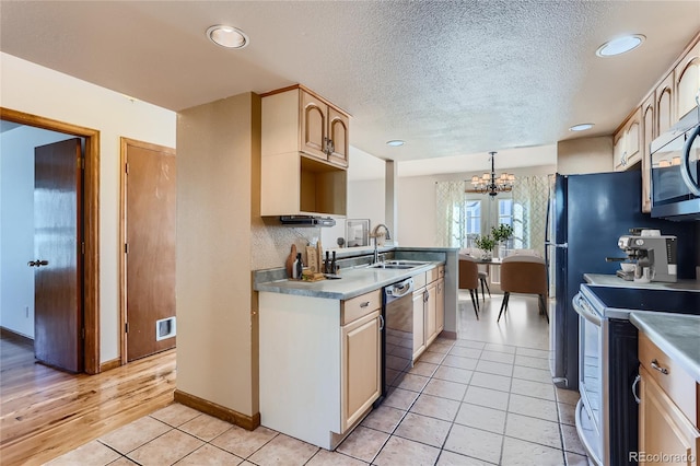 kitchen with black dishwasher, electric range, stainless steel microwave, hanging light fixtures, and light countertops