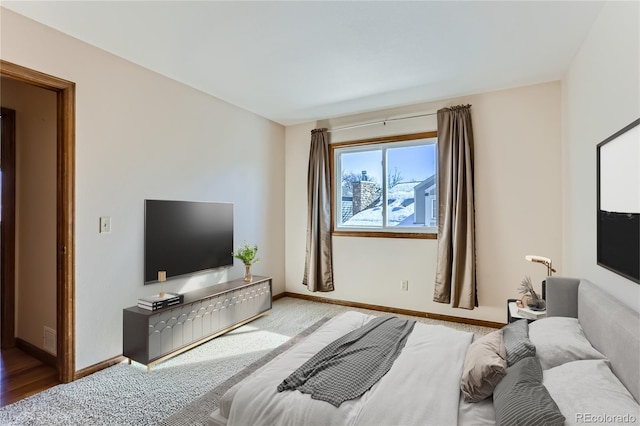 bedroom featuring visible vents and baseboards