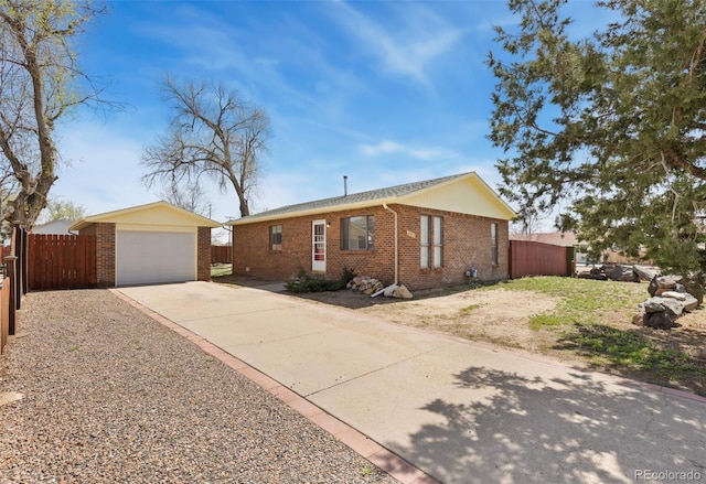 902 Pacific Pl, Fort Lupton, CO 80621 - ranch-style house with brick siding, driveway, and fence