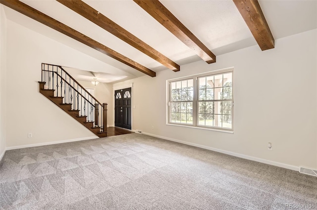 12454 Antelope Trl, Parker, CO 80138 - unfurnished living room with stairway and carpet