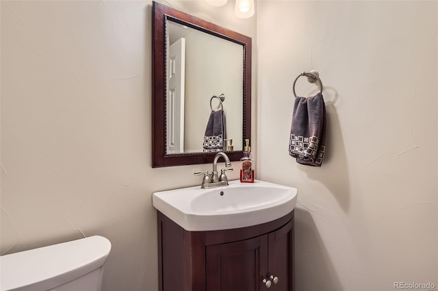 12454 Antelope Trl, Parker, CO 80138 - half bathroom featuring vanity and toilet