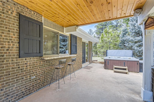 12454 Antelope Trl, Parker, CO 80138 - view of patio with a hot tub and an outdoor bar