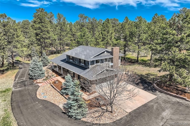 12454 Antelope Trl, Parker, CO 80138 - aerial view of property and surrounding area featuring a heavily wooded area