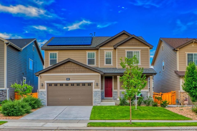 craftsman inspired home featuring a front yard and solar panels