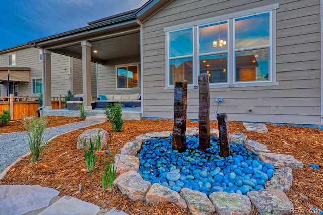 view of property exterior with a patio area