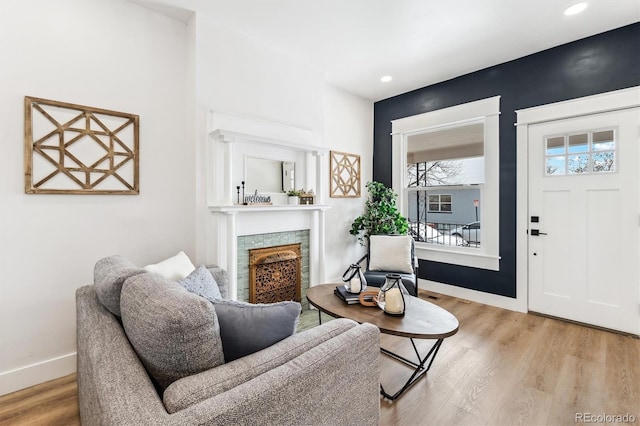 living room with light hardwood / wood-style floors