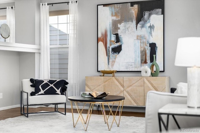 sitting room featuring wood finished floors and baseboards