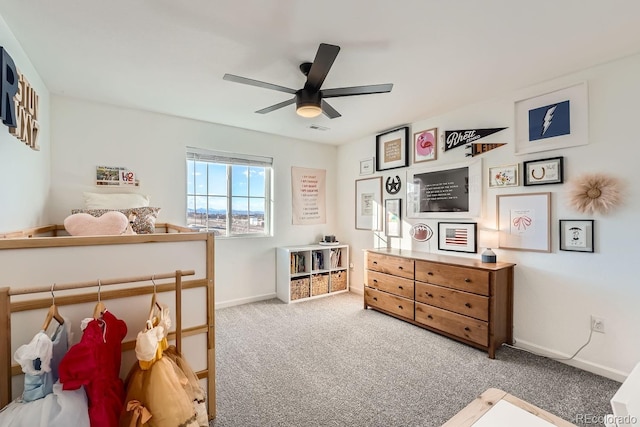 bedroom with ceiling fan and carpet