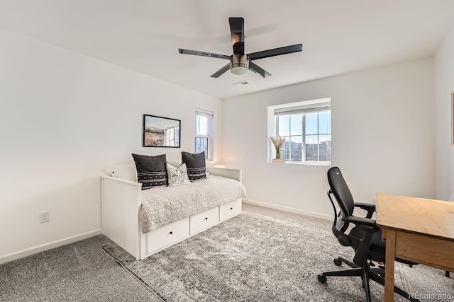 bedroom featuring ceiling fan and carpet flooring